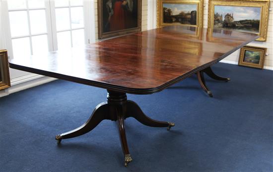 An early 19th century mahogany extending twin pillar dining table, Extended 10ft x 4ft 9.5in. x 1ft 1.5in.